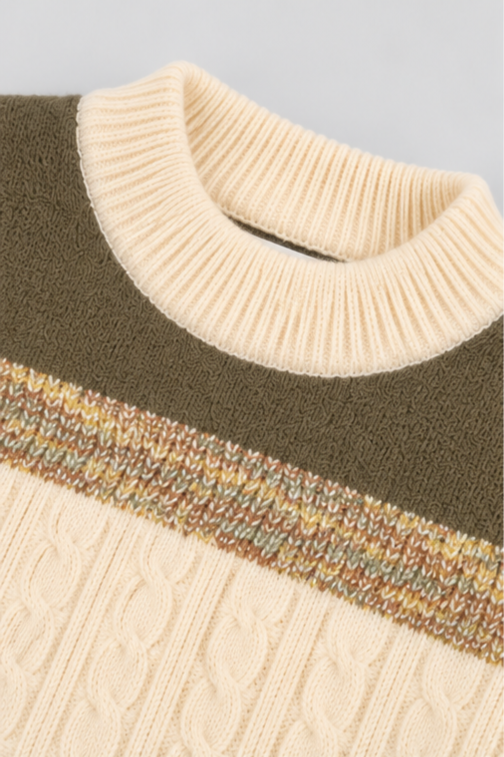 Close-up of cream ribbed round neckline and olive brown knitted stripe pattern on boys sweater FB-4281