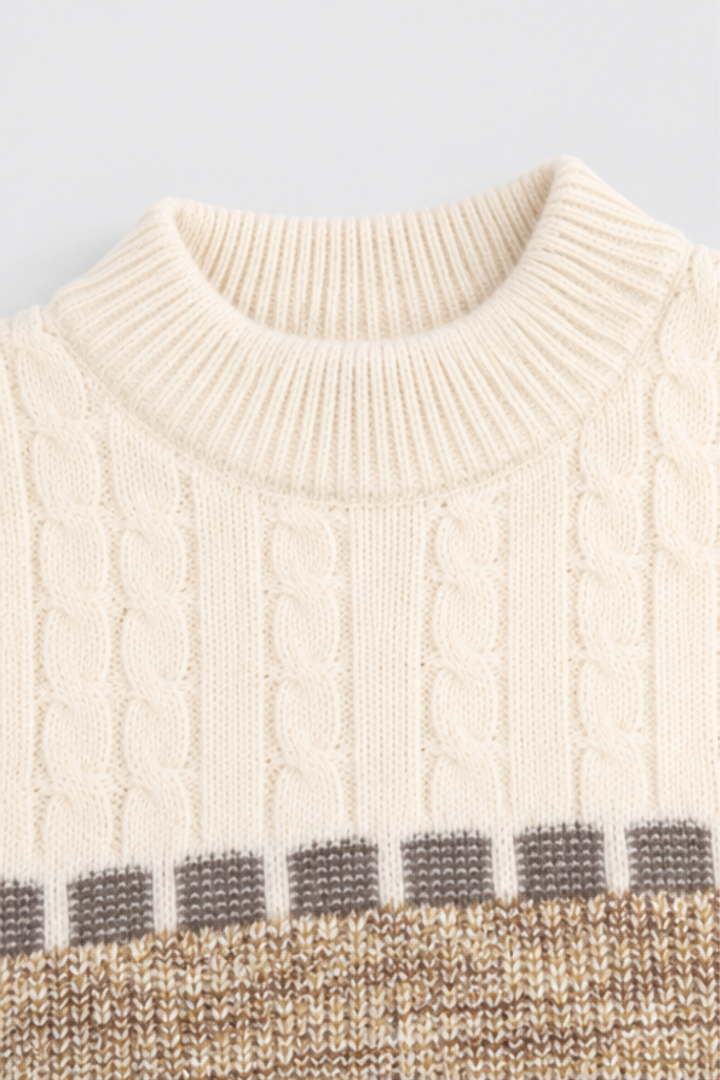 Close-up of cream ribbed round neckline and cable knit detailing on Featherhead kids winter sweater FB-4291