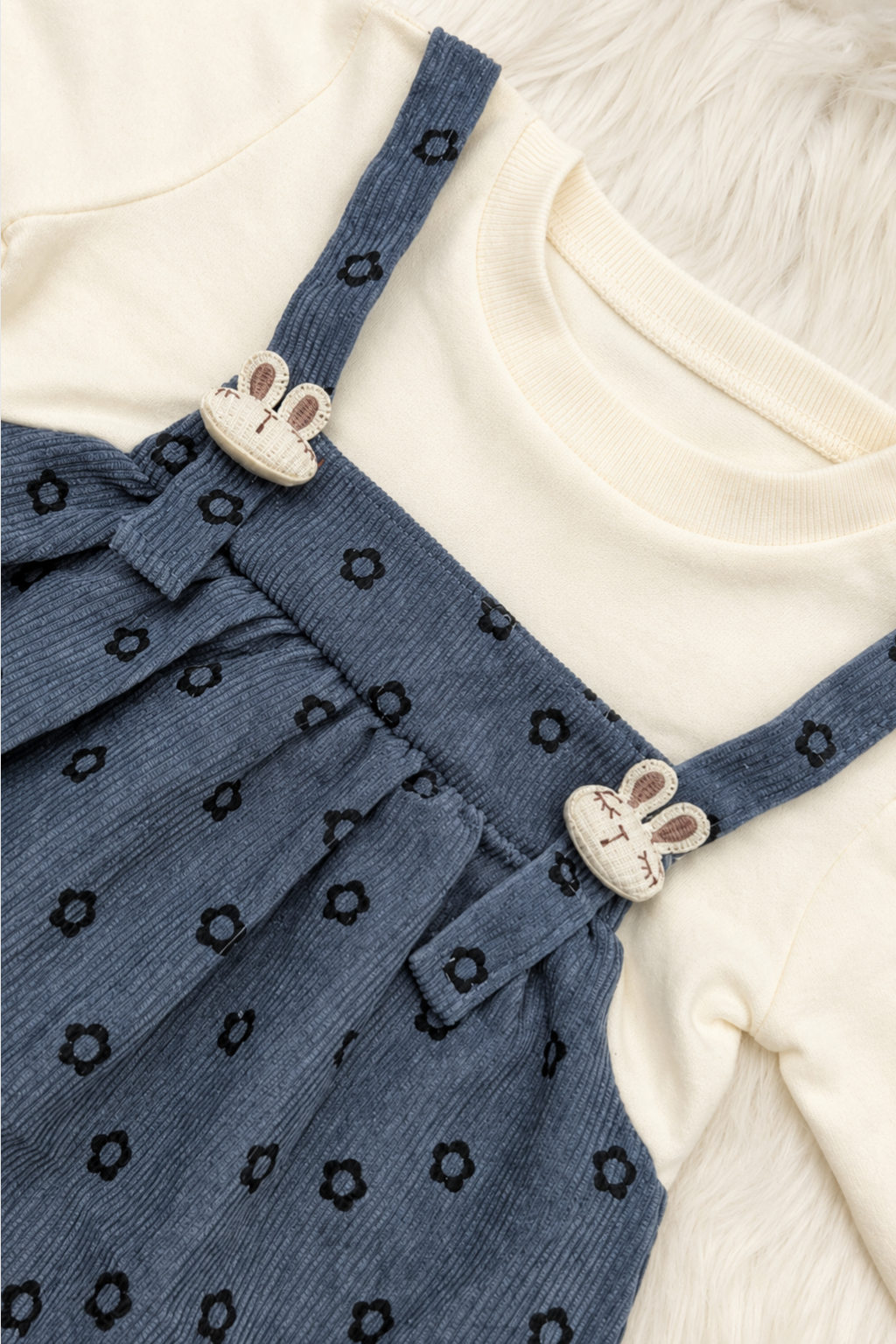 Close-up of bunny patch embroidery and premium cotton interlock fabric on Featherhead Girls Bunny Patch Frock FG-5643