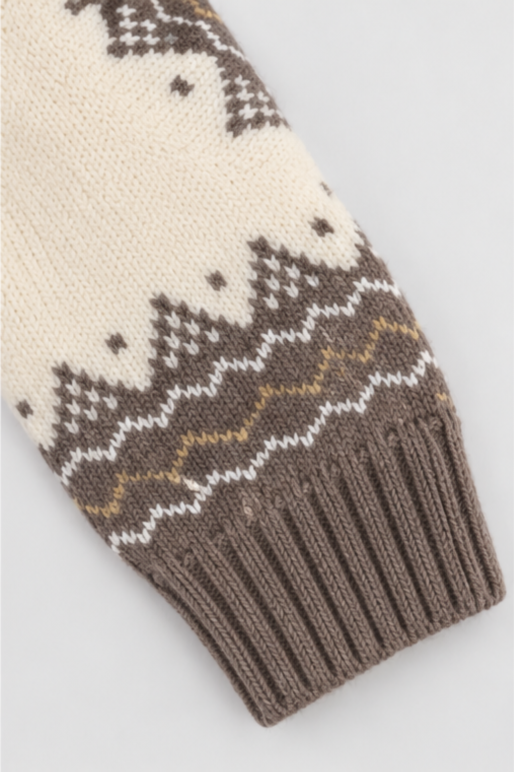 Cream and mocha brown Nordic patterned knitted sleeve with ribbed cuff on Featherhead sweater FB-4247