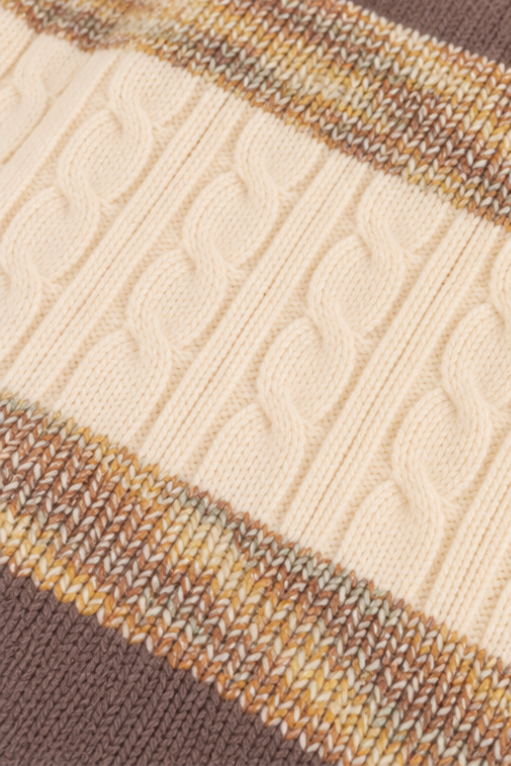 Detailed close-up of cream cable knit texture and brown knitted stripes on boys winter sweater FB-4276