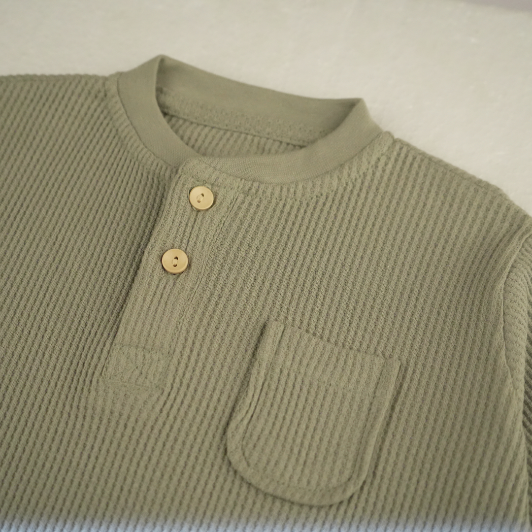 Close-up of FN-6513 cotton waffle thermal shirt with buttons in sea grass color.