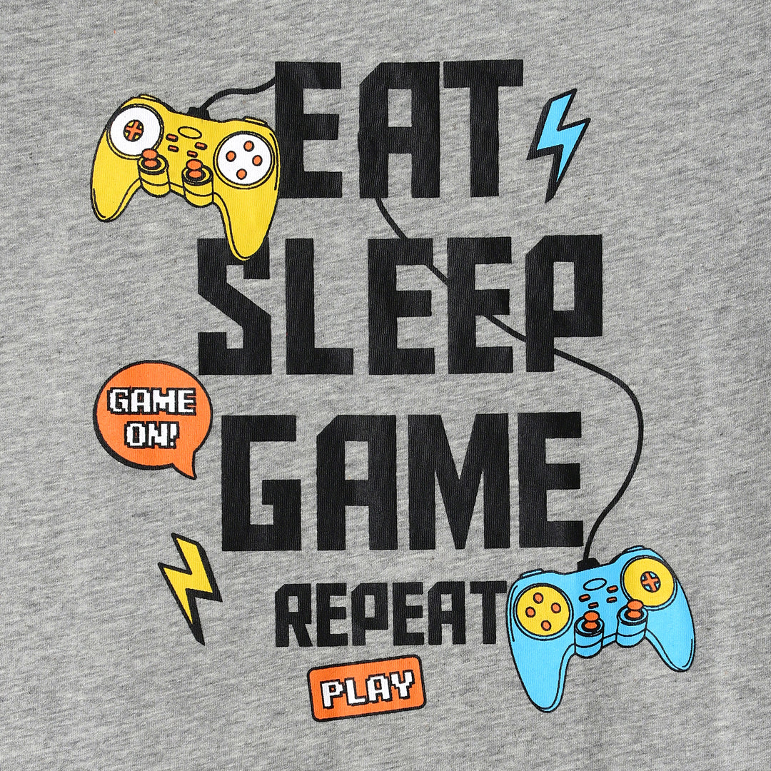 Graphic close-up of “Eat Sleep Game Repeat” text