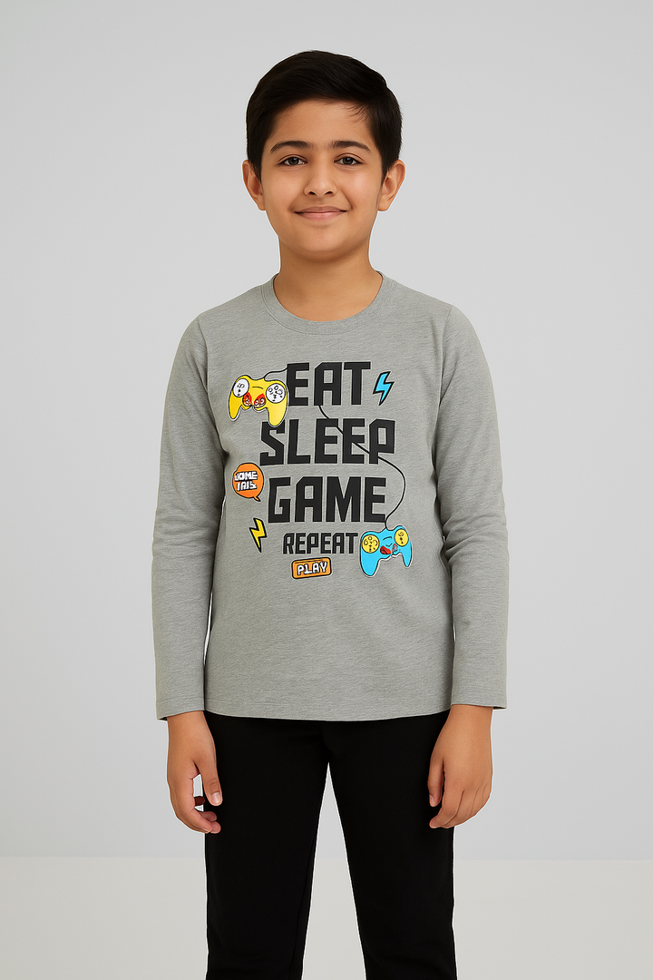 Boy in long-sleeve grey T-shirt with gaming print