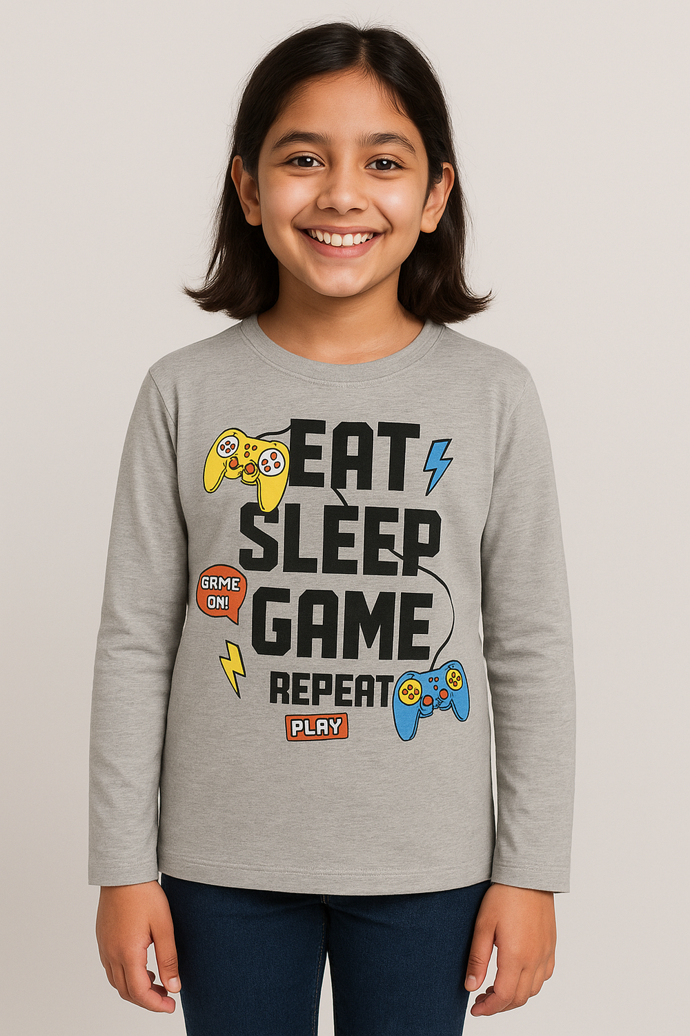 Girl wearing grey gamer-themed T-shirt