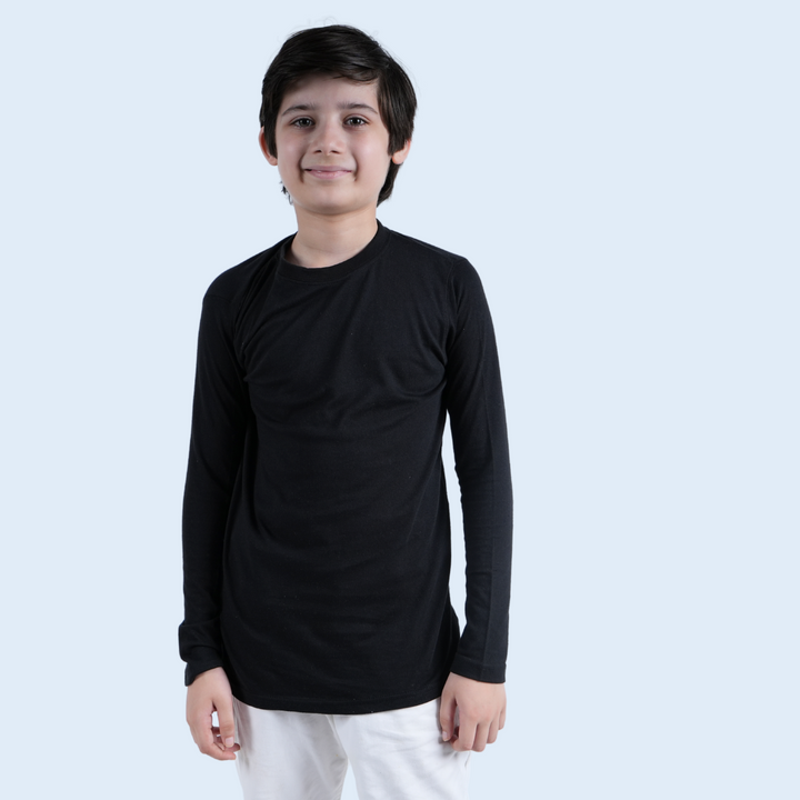 Boy wearing black long sleeve T-shirt