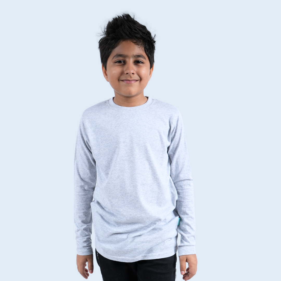 Boy wearing grey long sleeve T-shirt