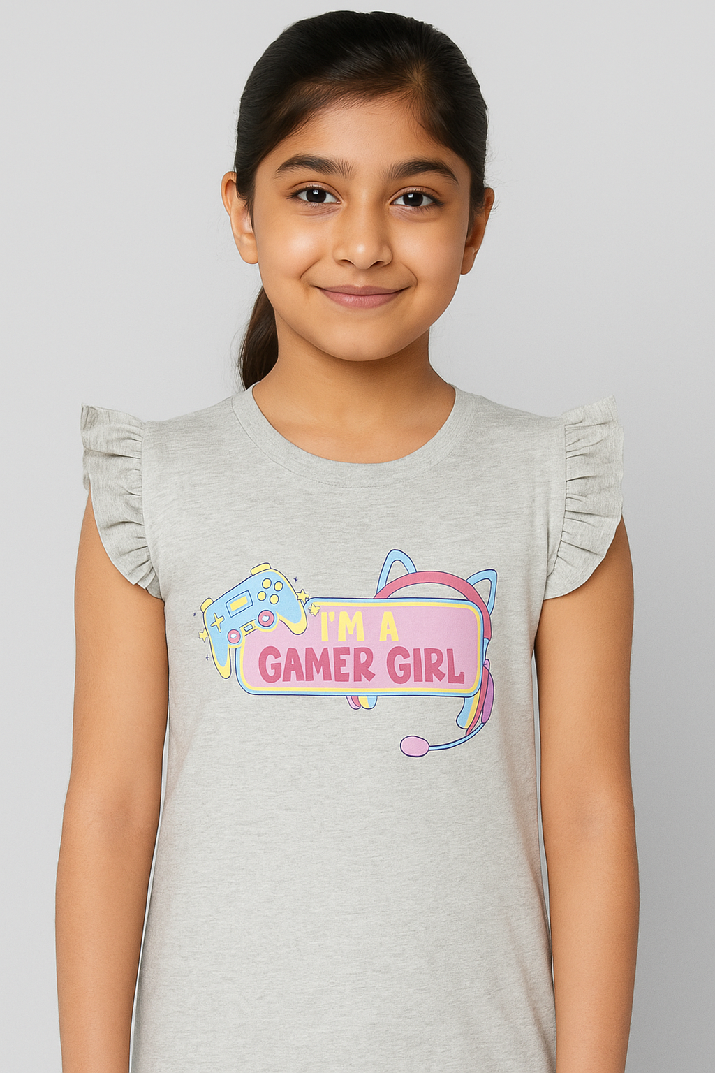 Girl wearing grey tanktop shirt with “I’m a Gamer Girl” print